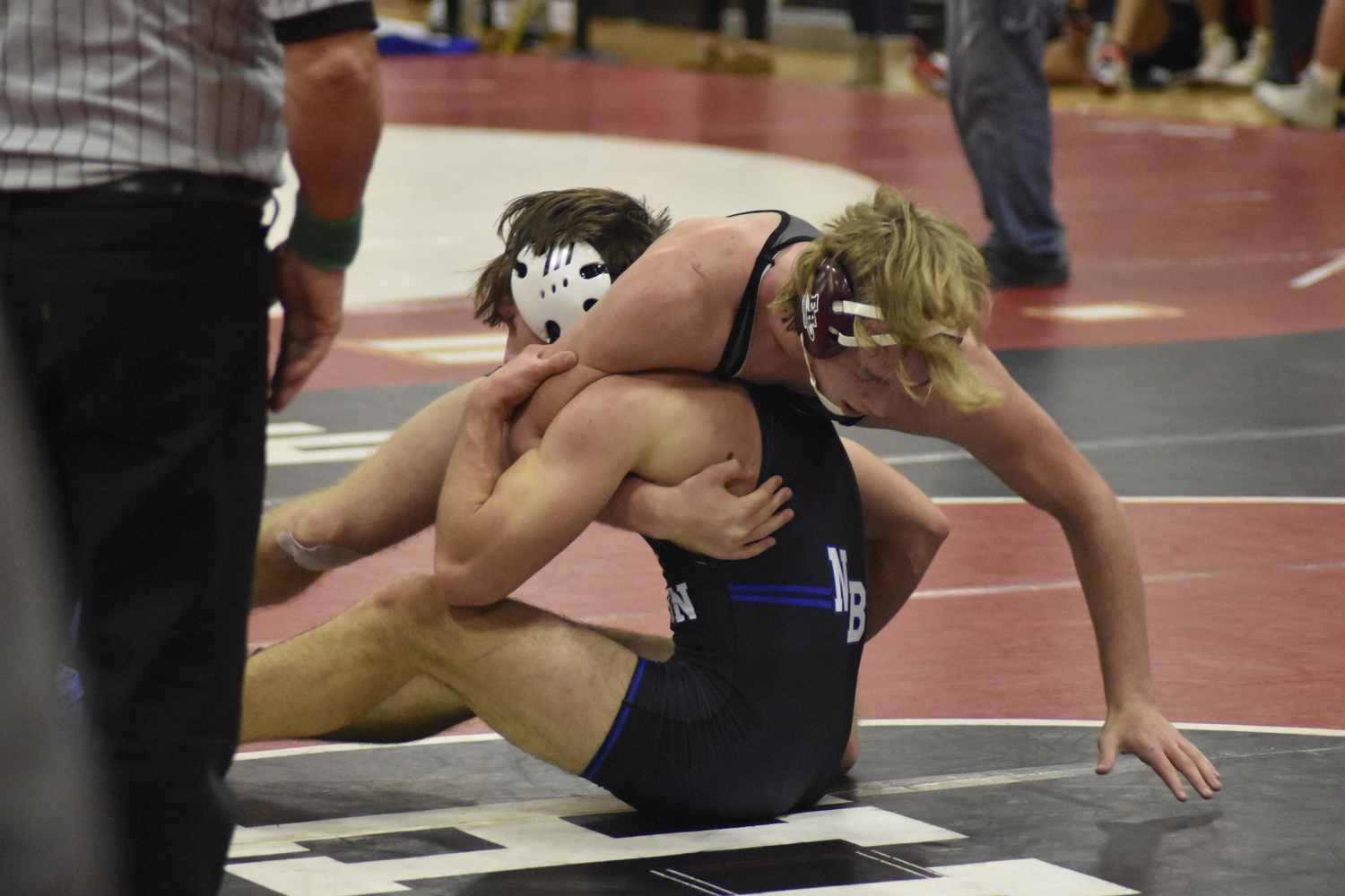 East Hampton's Adam Beckwith works on getting a pin.   DREW BUDD