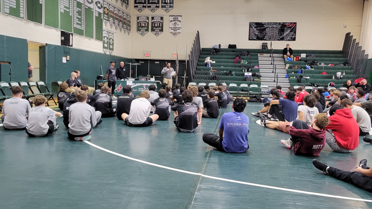 East Hampton head coach Ethan Mitchell, a Westhampton Beach graduate and former teammate of Cory Hubbard, speaks on behalf of the tournament's namesake on Saturday morning.   DREW BUDD