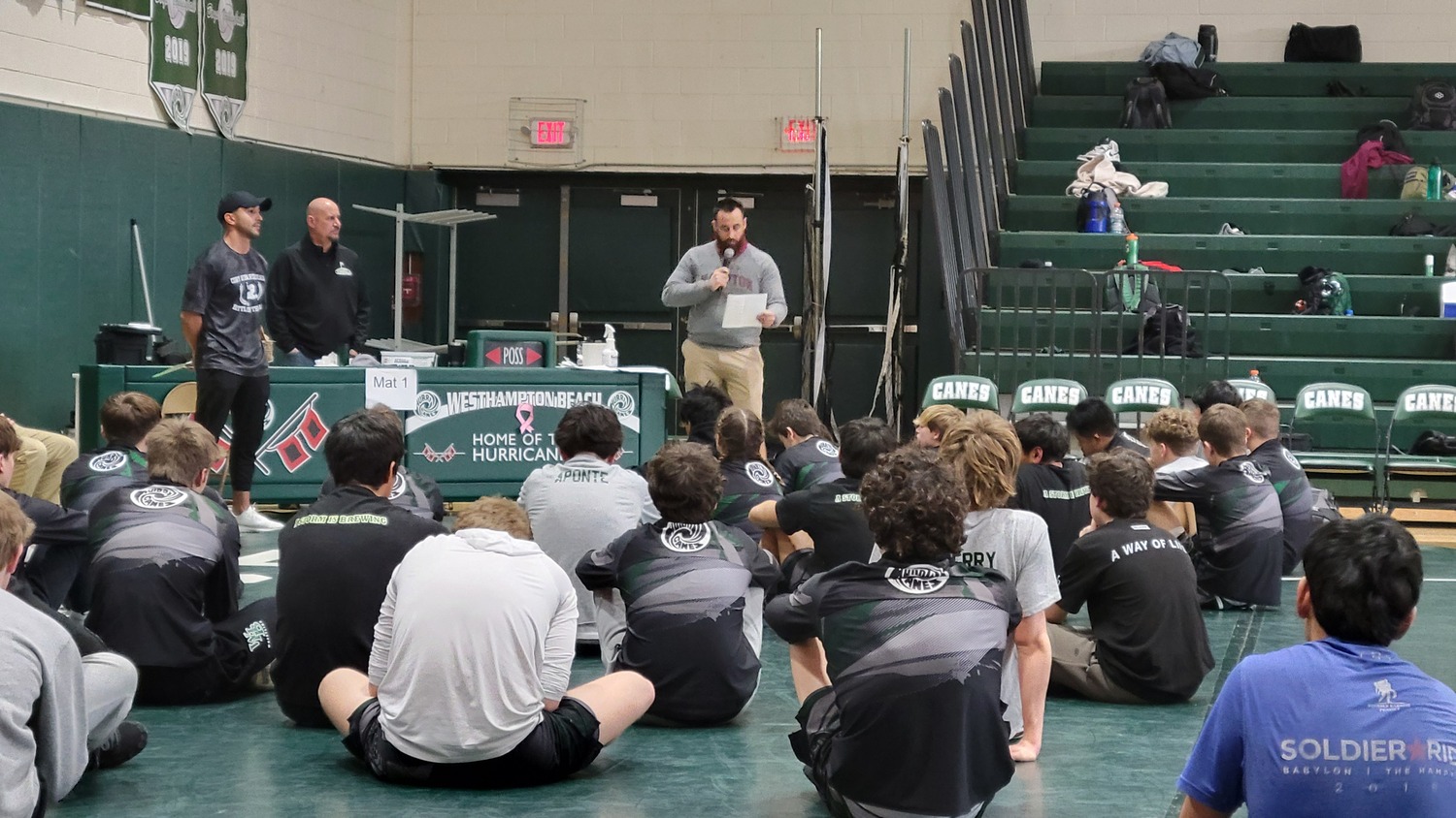 East Hampton head coach Ethan Mitchell, a Westhampton Beach graduate and former teammate of Cory Hubbard, speaks on behalf of the tournament's namesake on Saturday morning.   DREW BUDD