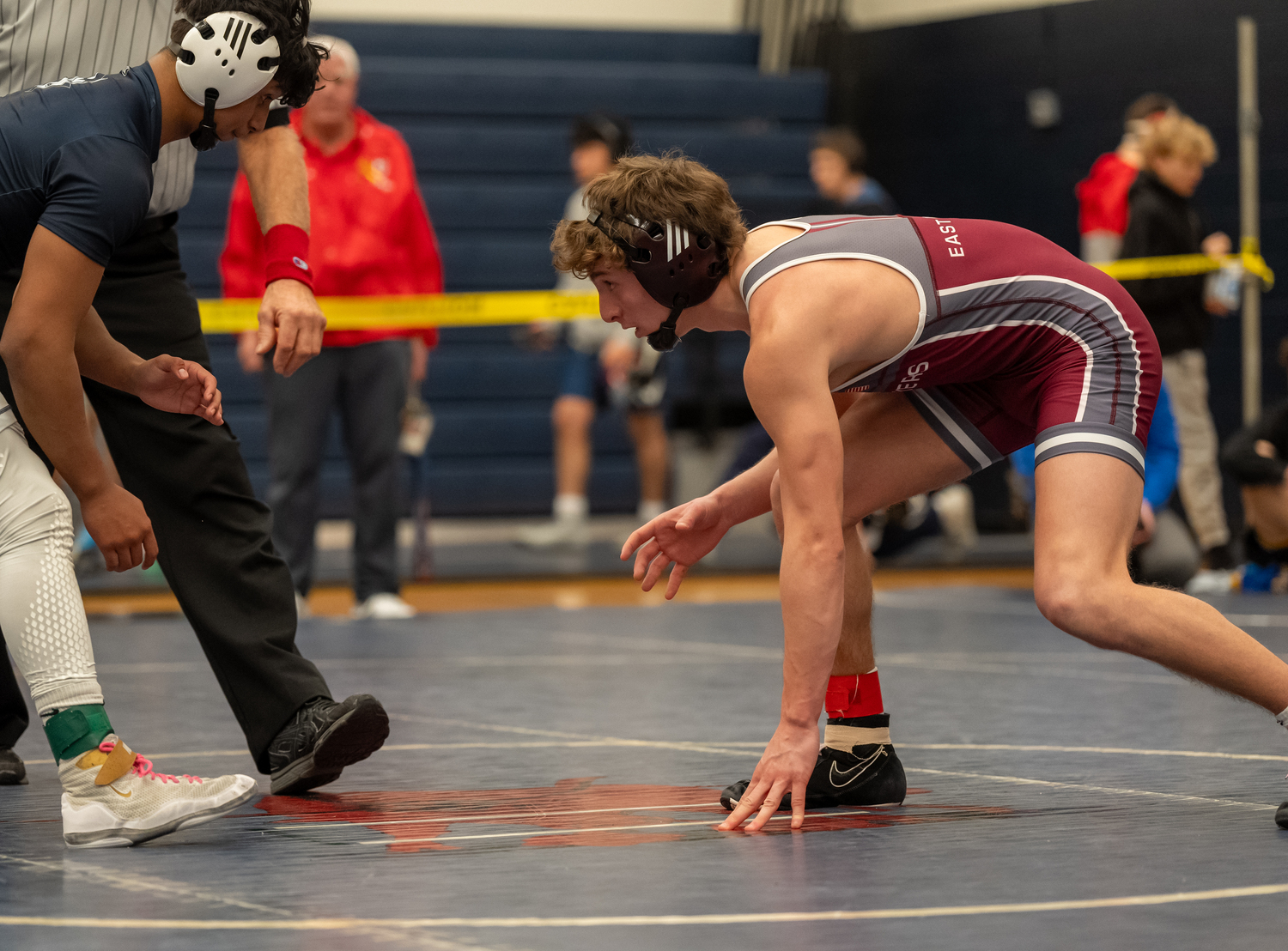 East Hampton's Luke Castillo battling Huntington's Brandon Canas in the quarterfinals of the 145-pound weight class, which Castillo won by pin.   RON ESPOSITO