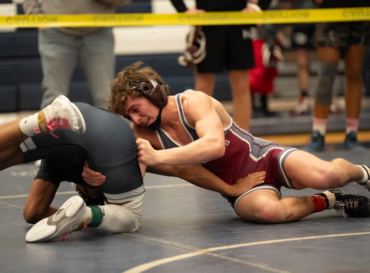 East Hampton's Luke Castillo battling Huntington's Brandon Canas in the quarterfinals of the 145-pound weight class, which Castillo won by pin.   RON ESPOSITO