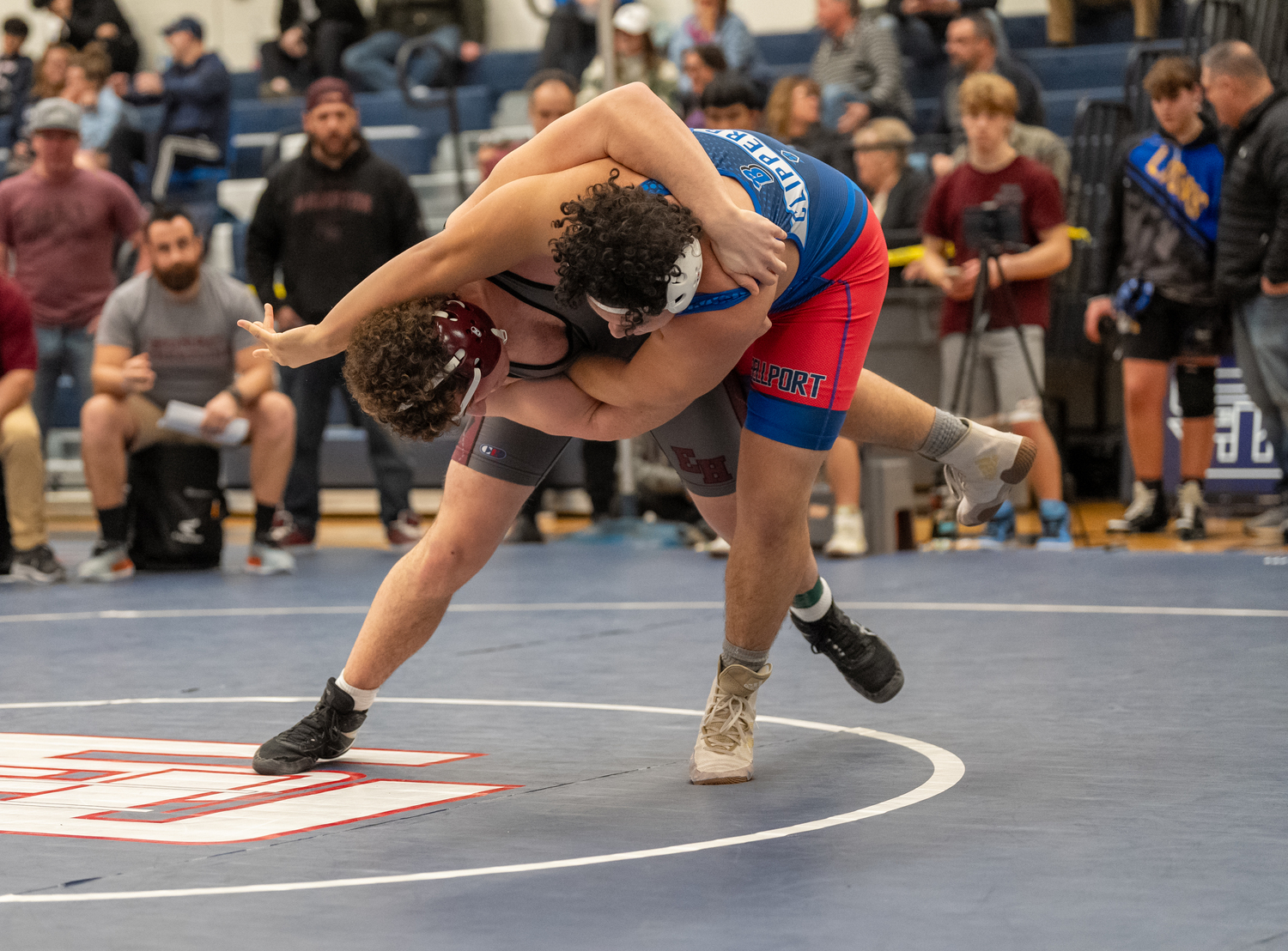 East Hampton's Franco Palombino wrestles down Bellport's Justin Calero to the mat in their quarterfinals match.   RON ESPOSITO