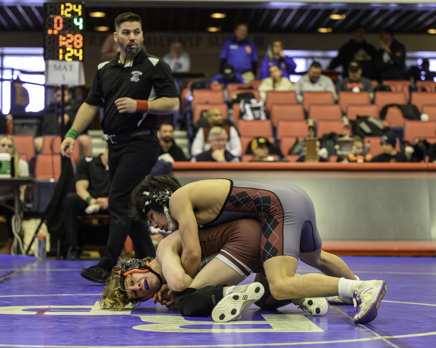 Juan Roque working against Walt Whitman's Ryan Maiorana in the second round on Saturday.   MARIANNE BARNETT