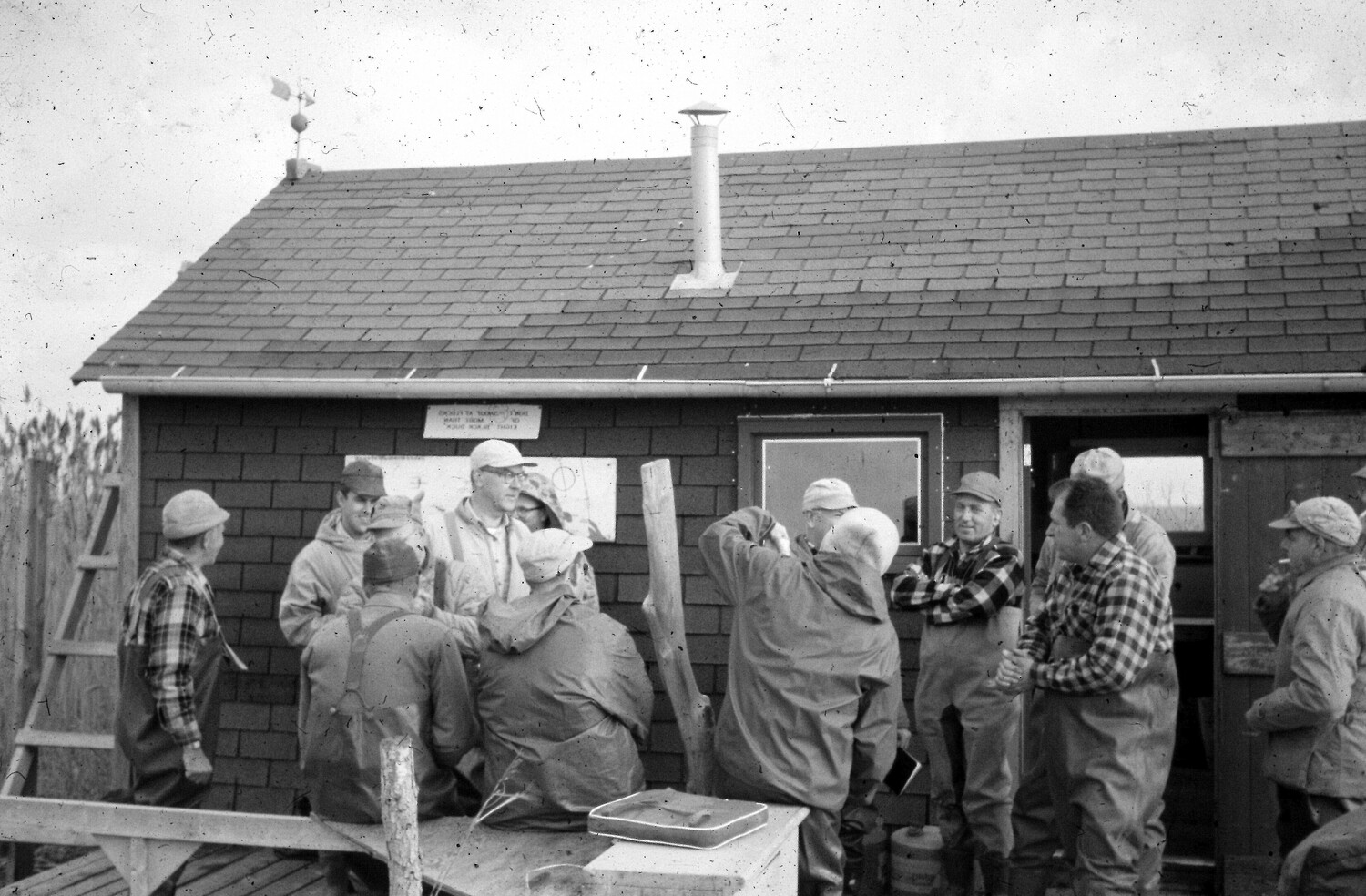 Members of the Pattersquash Gunners Association convening at the former clubhouse, which was destroyed in Superstorm Sandy.