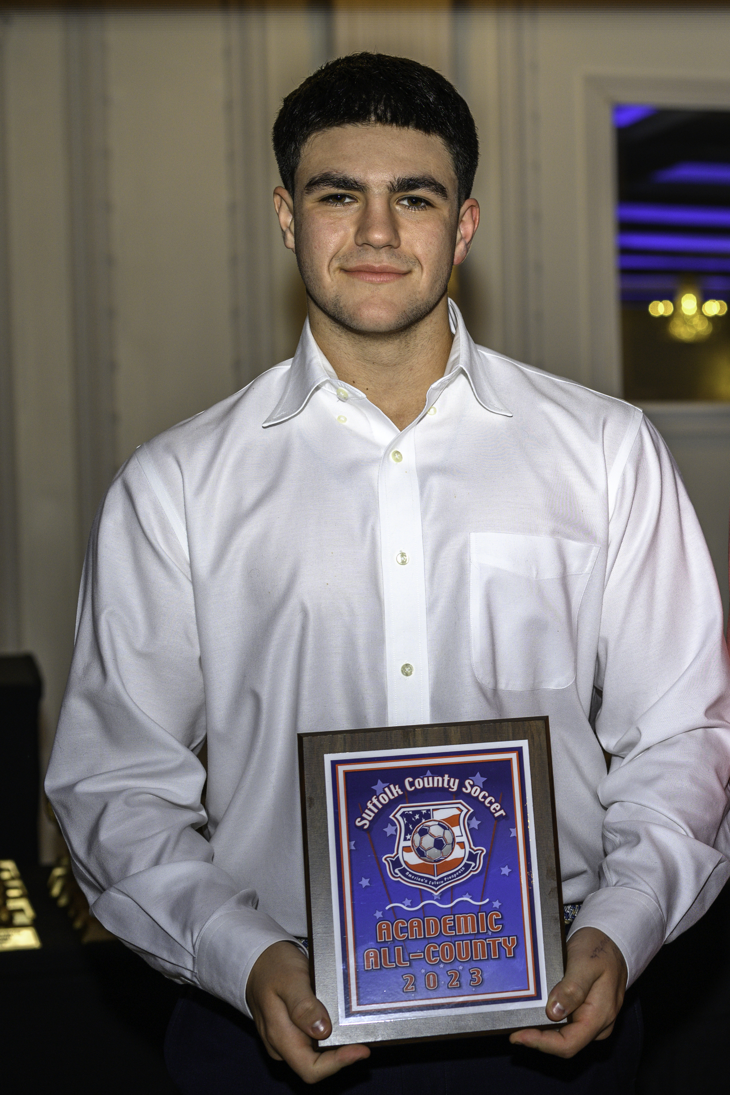 Pierson's Augustus Hayes with his All-Academic plaque.   MARIANNE BARNETT