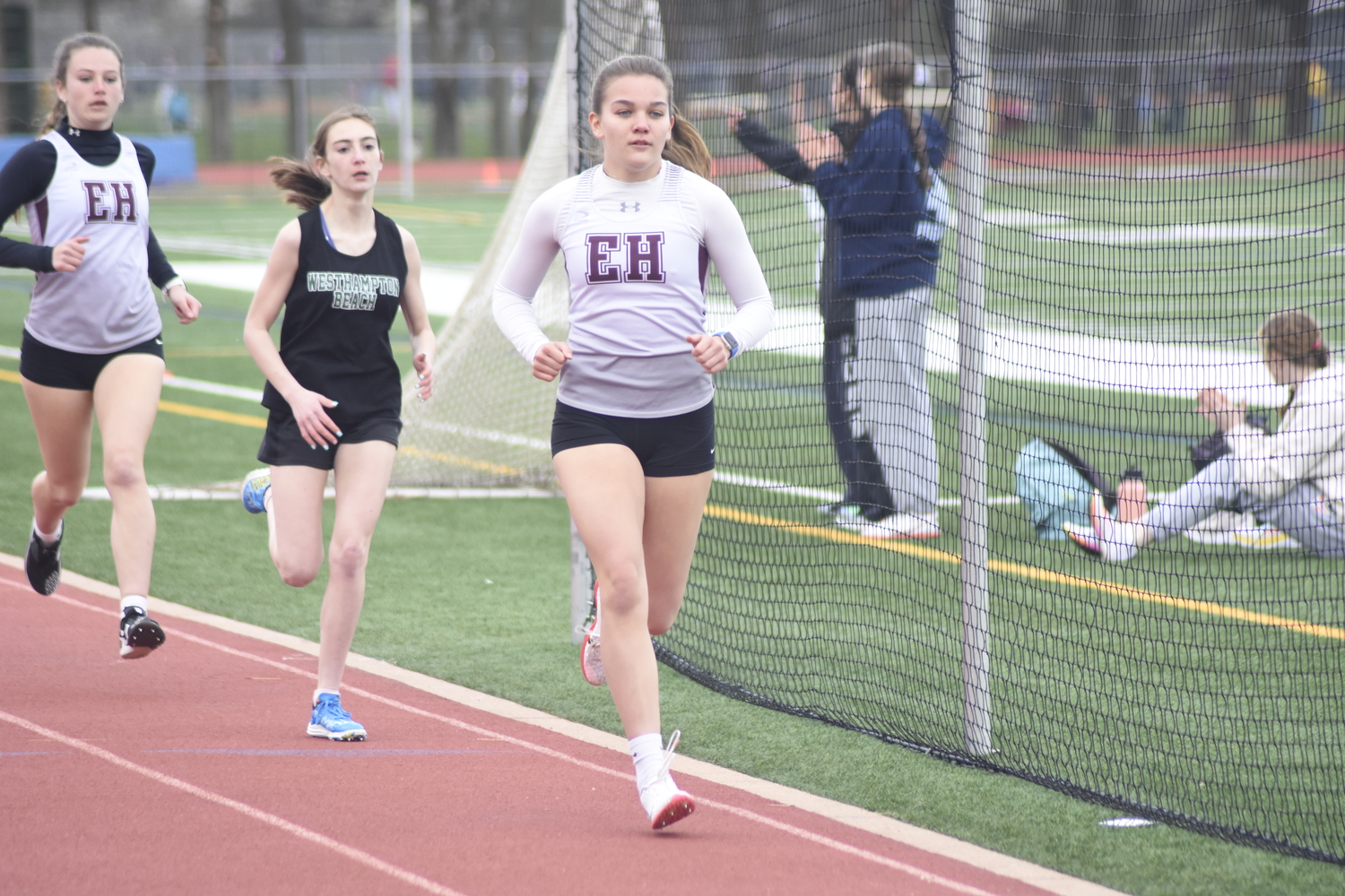 Greylynn Guyer beats out a Westhampton Beach runner in the 800-meter run.   DREW BUDD