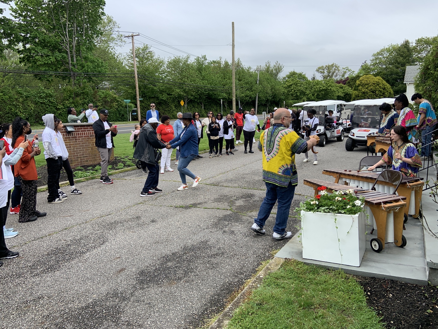 The Bridgehampton School's marimba ensemble greeted the congregation on its arrival. STEPHEN J. KOTZ