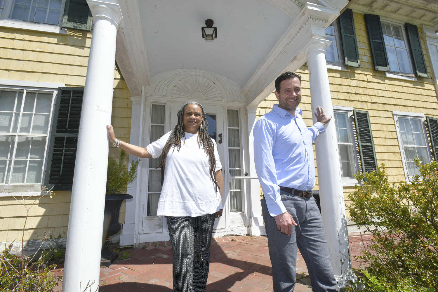 Donnamarie Barnes. director of history and heritage for Sylvester Manor and Executive Director Stephen Searl at the manor house.  DANA SHAW