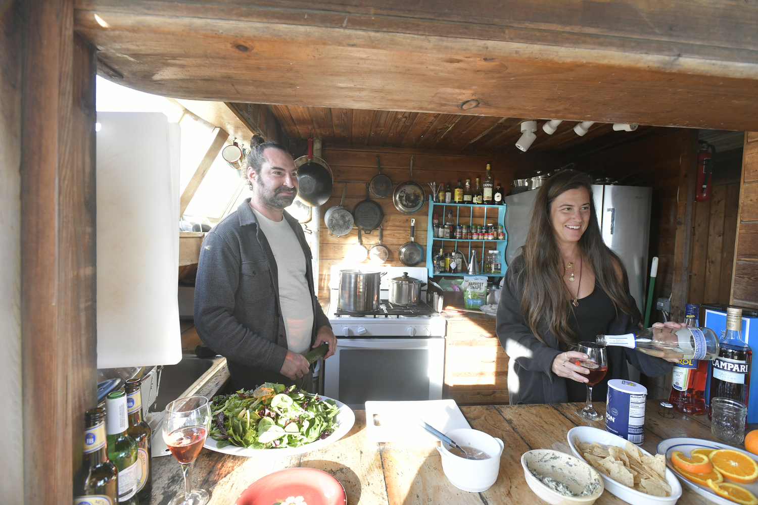 Matt and Monica Frisbie in the kitchen of their home in Amagansett.  DANA SHAW