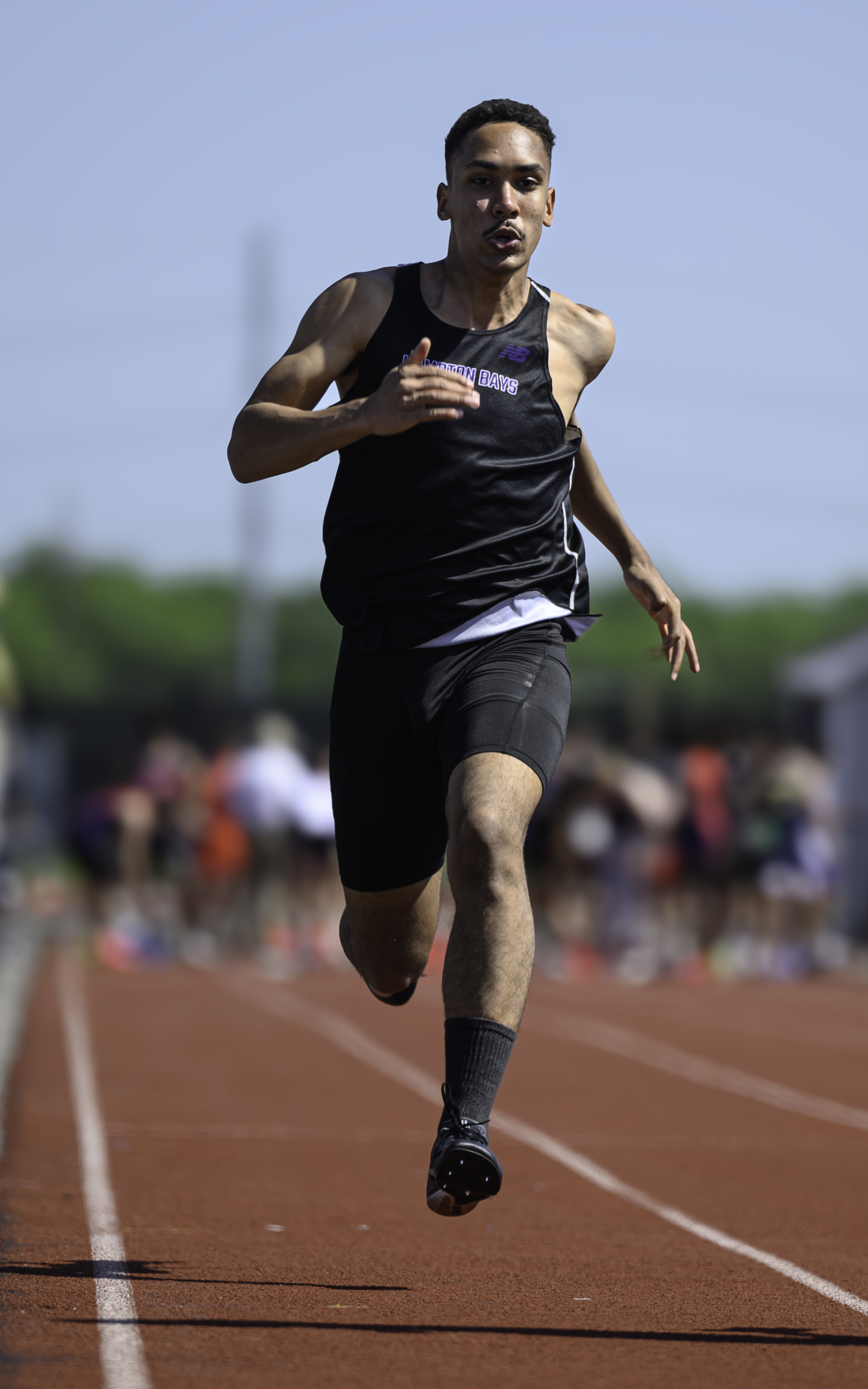 Hampton Bays senior Hamlet Jimenez in the 100-meter dash.  MARIANNE BARNETT