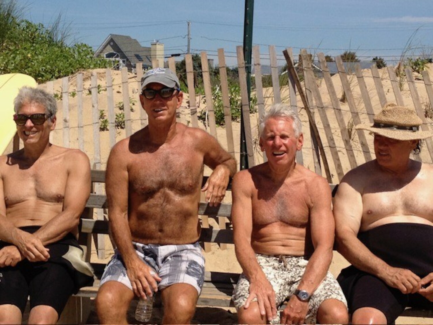 Social hour at the Ditch Plains bench. From left, Randy Rosenthal, George Drago, Dave Nelson and Tony Villar. COURTESY DAVE NELSON