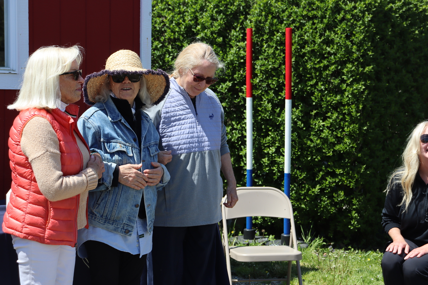 CTREE Executive Director Karen Bocksel chats with clients before they go out into the field for some grooming. CAILIN RILEY