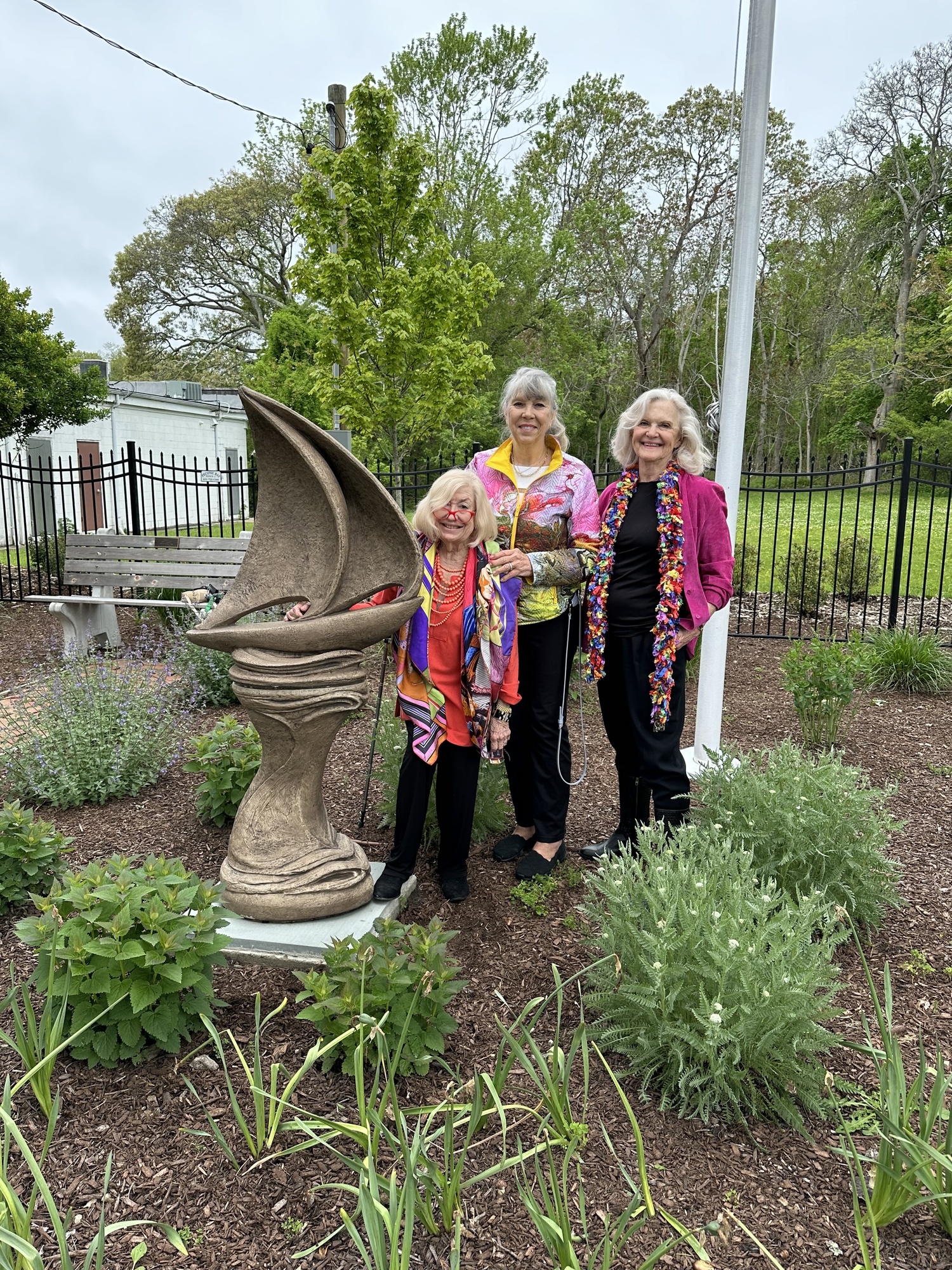 From left to right: Jane H. Macon, Susan von Freddi, Patricia L. Francy with the new sculpture. DAN STARK