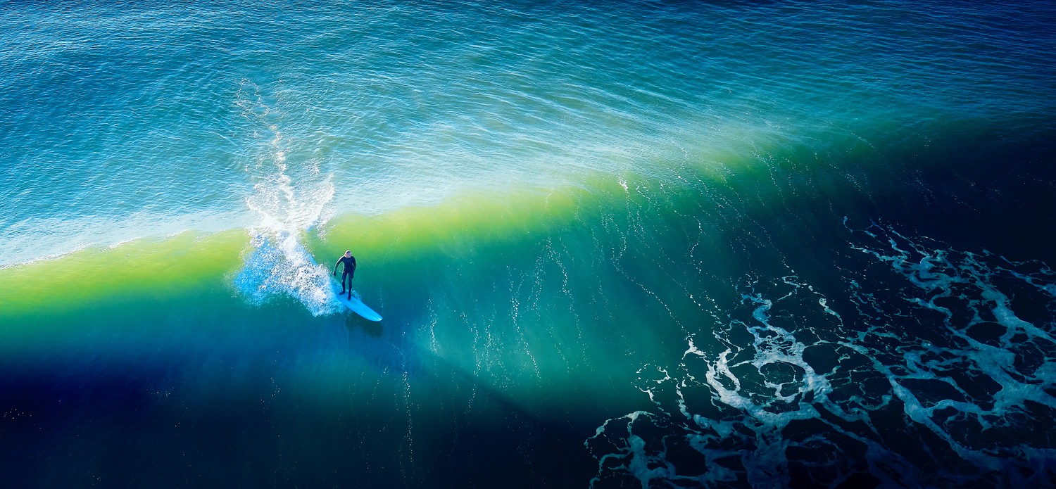 Catching at wave at Ditch Plains Beach. JOHN MADERE