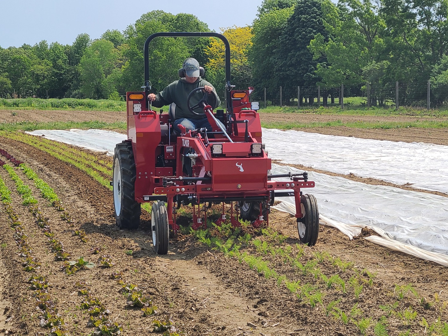 Quail Hill Farm Director Layton Guenther working at the farm. COURTESY PECONIC LAND TRUST