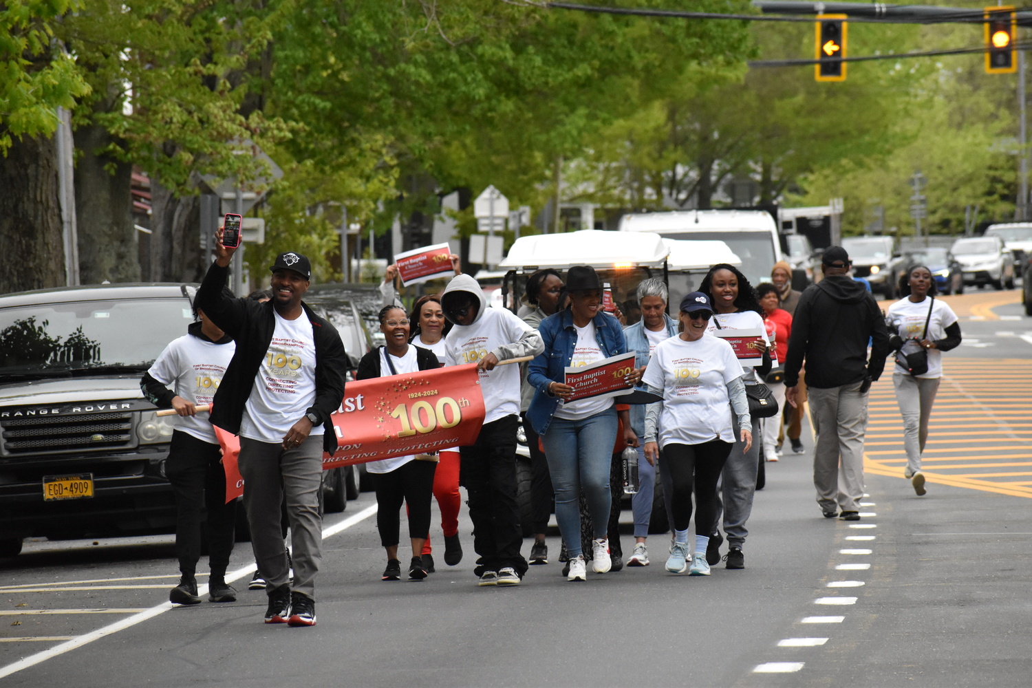 Members of the First Baptist Church of Bridgehampton marched on Montauk Highway on Sunday from their original home on Corwith Avenue to their current church on the Bridghampton-Sag Harbor Turnpike to celebrate the congregation's centennial. STEPHEN J. KOTZ