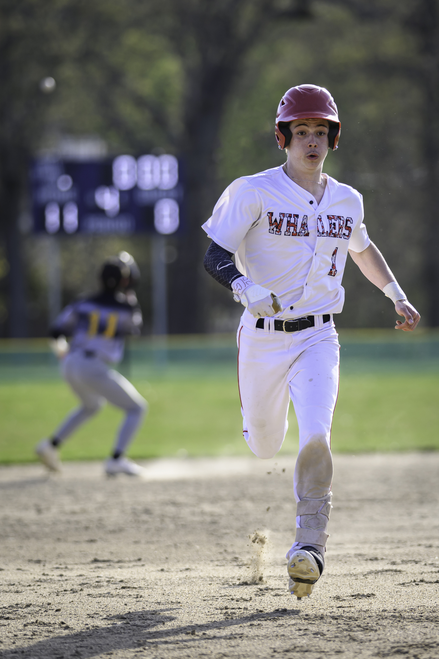 Senior Whaler Dom Mancino heads to third.  MARIANNE BARNETT