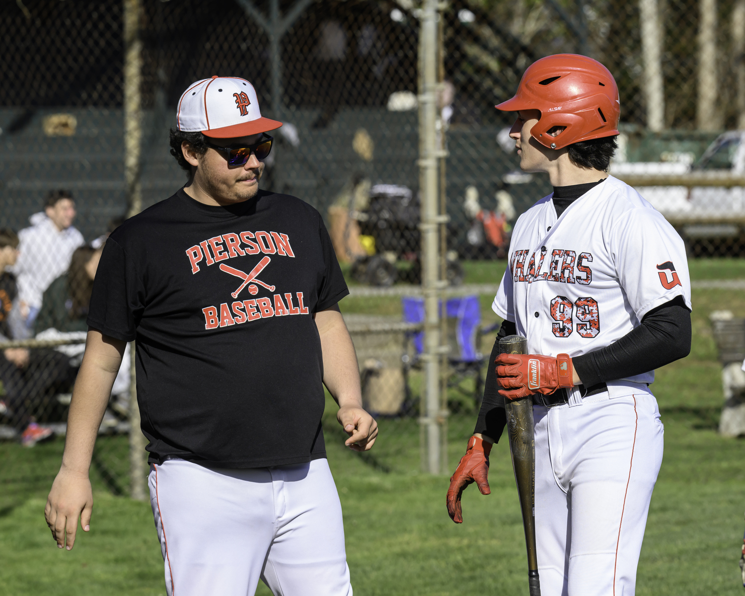 Assistant coach Tyler LaBorne, left, and Lucas Iulo.   MARIANNE BARNETT