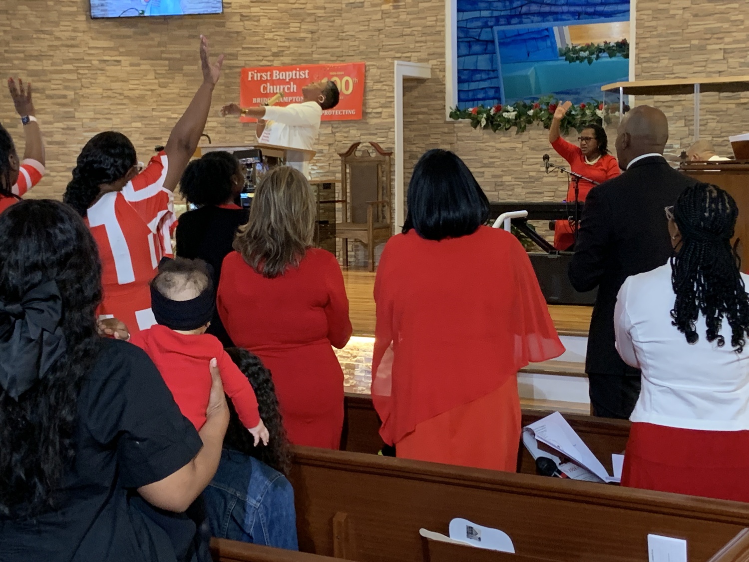 The Reverend Tisha Williams preaching at the First Baptist Church of Bridgehampton's centennial observance on Sunday. STEPHEN J. KOTZ