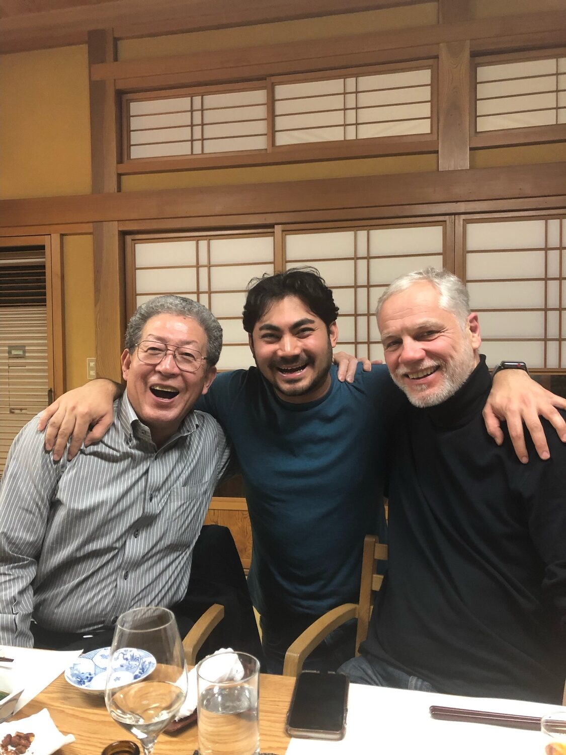 Jesse Matsuoka, center, and Roman Roth, right with the brewmaster from Hakkaisan Brewery in Niigata, Japan during their 2019 trip. COURTESY ROMAN ROTH