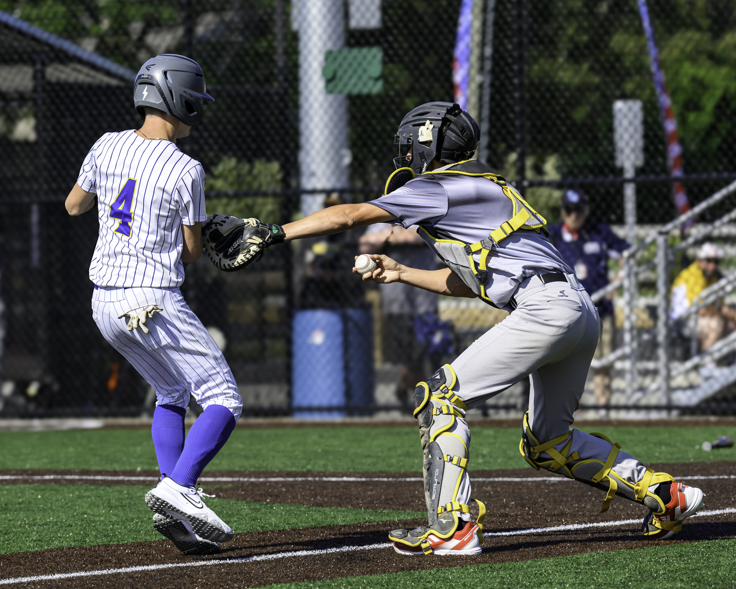 Ross freshman Elliot Mcgonegal tags a runner out. MARIANNE BARNETT