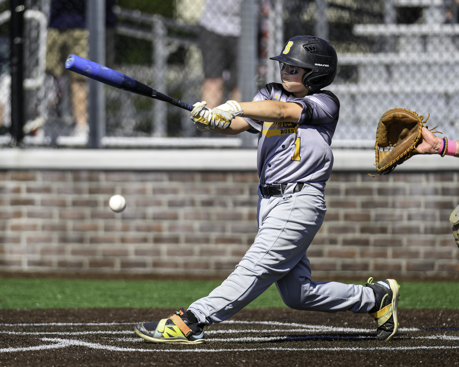 Bridgehampton seventh-grader Finn Alversa connects with a pitch. MARIANNE BARNETT