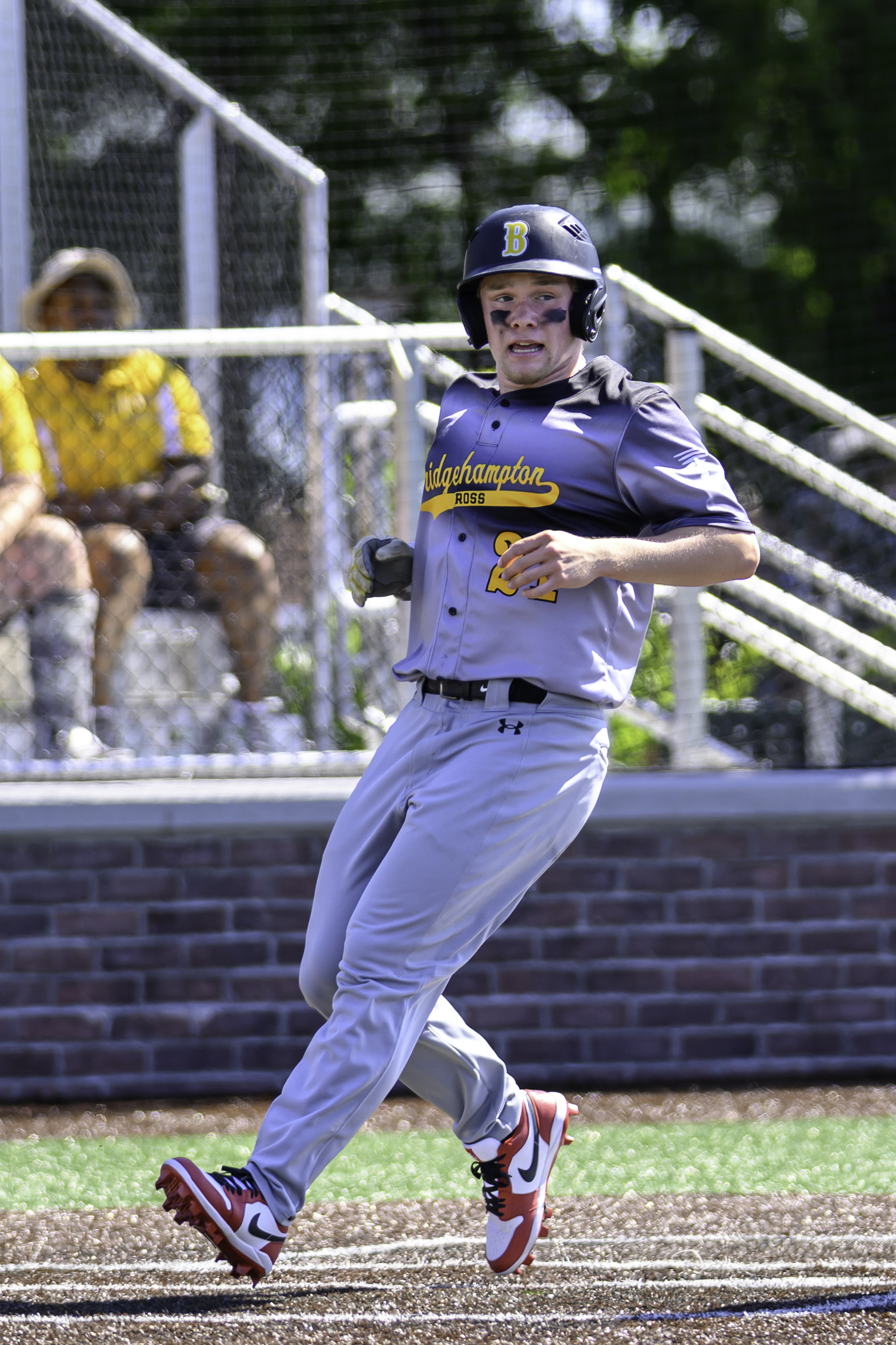 Ross junior Shawn Gnyp crosses home plate. MARIANNE BARNETT