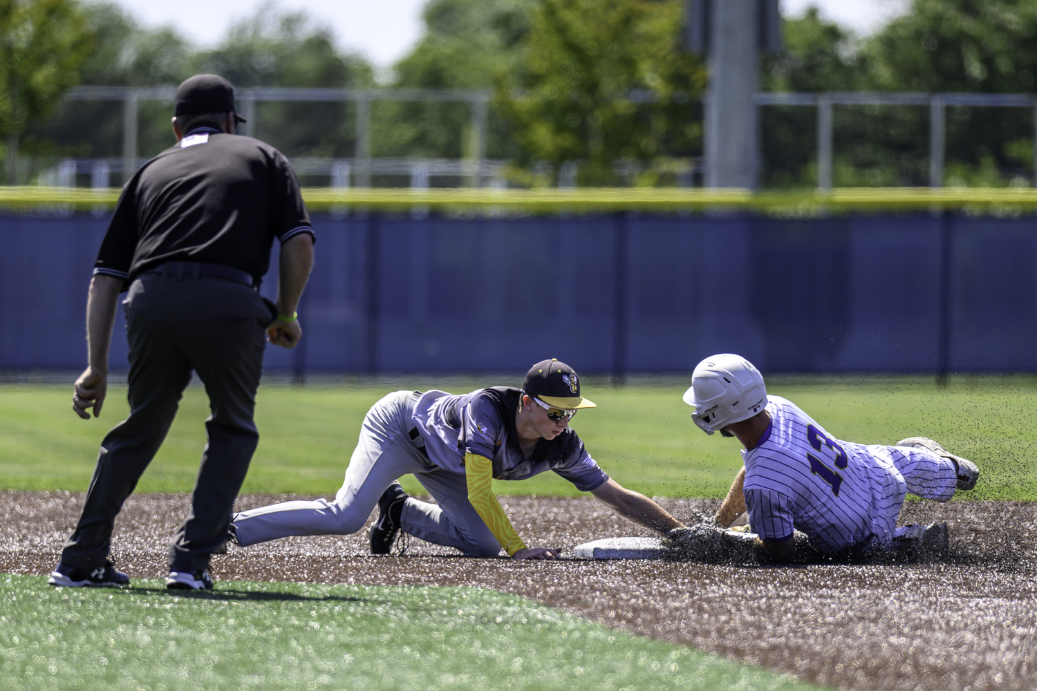 Ross sophomore short stop Tate Foard makes a play. MARIANNE BARNETT