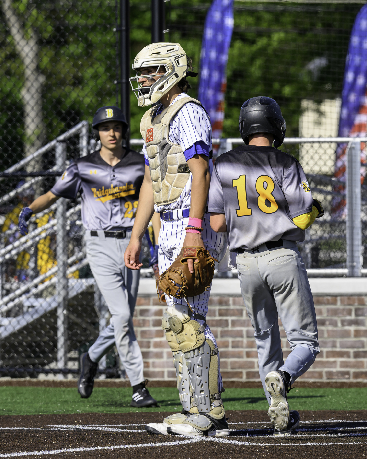 Ross sophomore Tate Foard scores a run. MARIANNE BARNETT