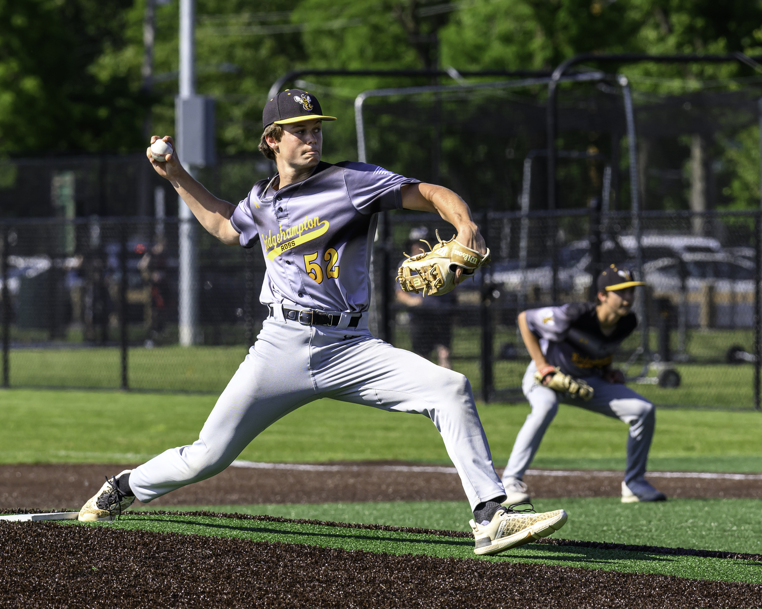 Ross senior Milo Tompkins fires a pitch. MARIANNE BARNETT