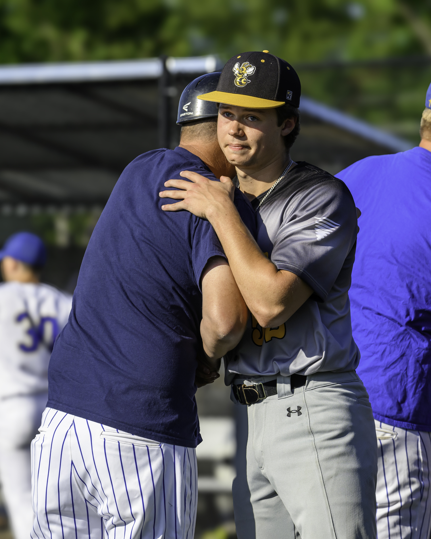 Ross senior Milo Tompkins is recognized by Chapel Field's head coach. MARIANNE BARNETT