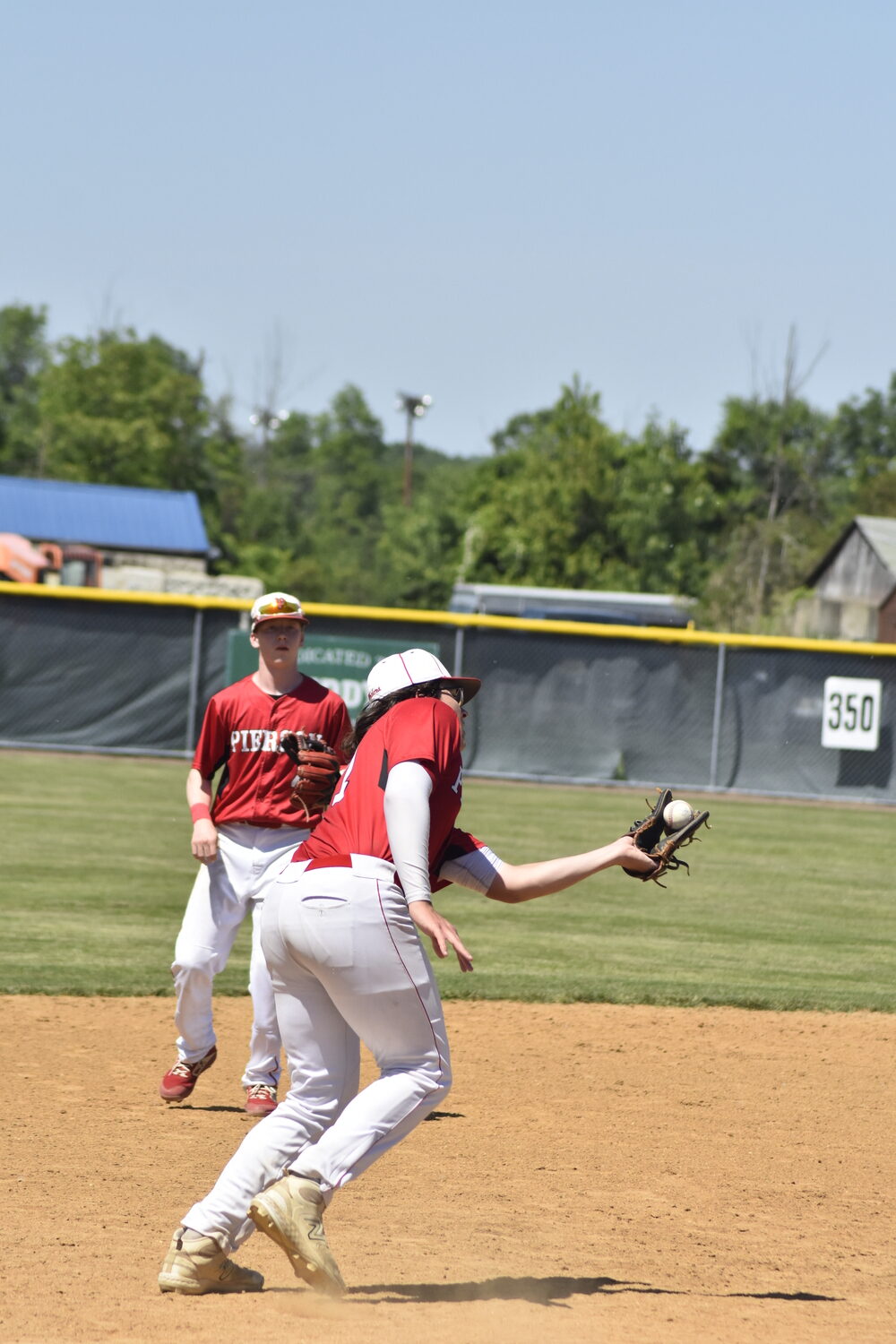 Pierson senior Charles Schaefer catches a fly ball.   DREW BUDD