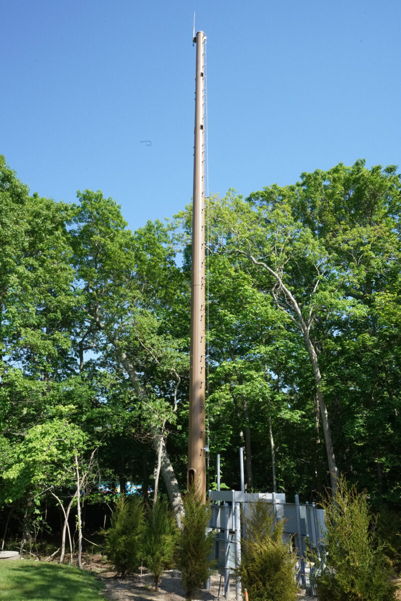 After nine years of review and legal jousting, AT&T Wireless erected a cellular tower next to the St. Peter's Chapel in Springs this week. DOUG KUNTZ