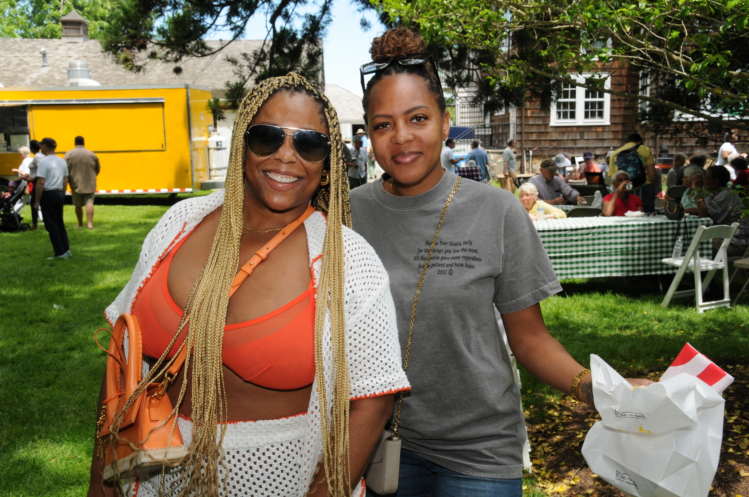 Stephanie Hay and Jenelle Myers at the LVIS annual Fair on Main Street In East Hampton on Saturday,   RICHARD LEWIN