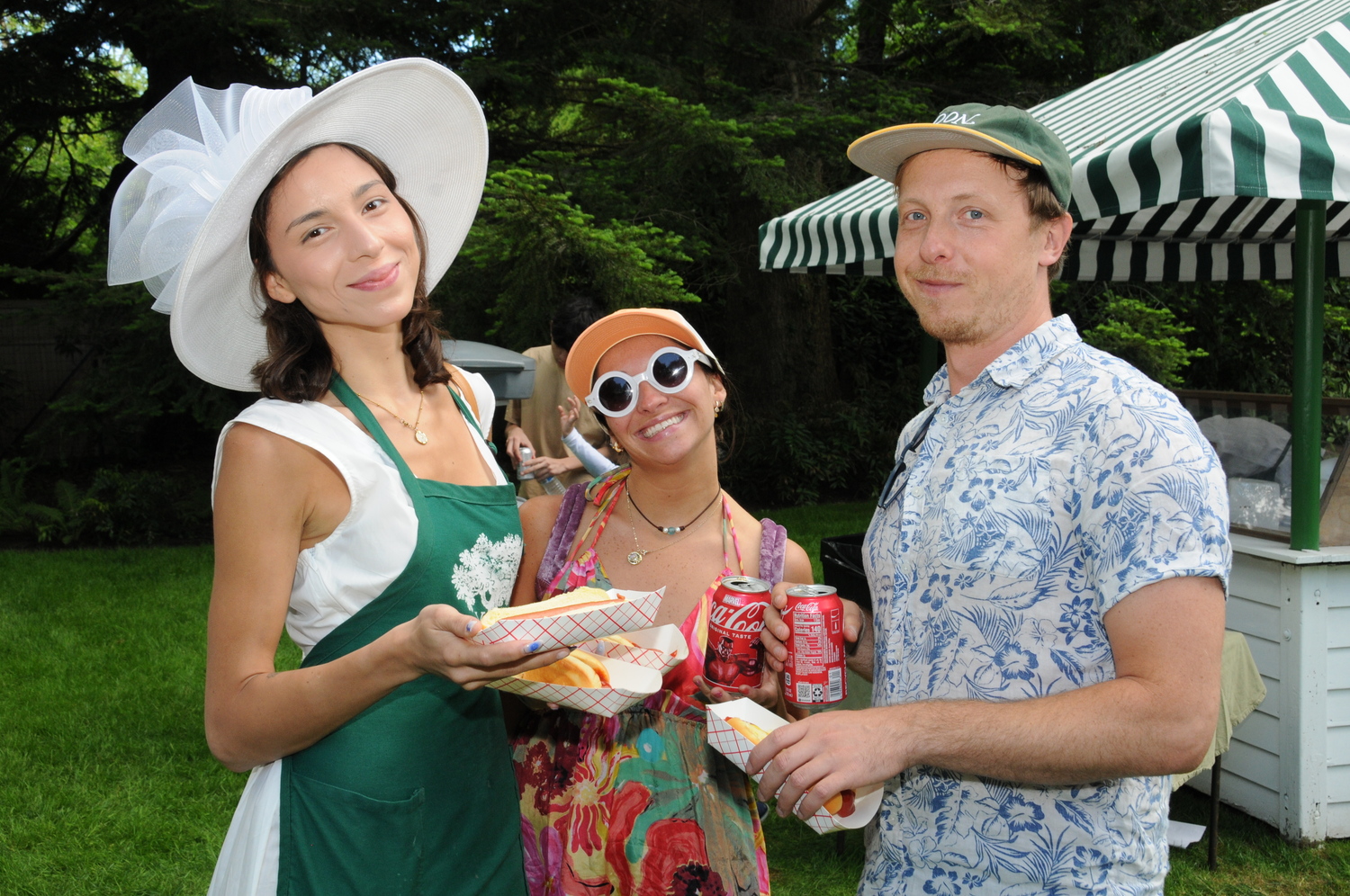 Erika Gomez, Hannah Foster and Scott Bludorne at the LVIS annual Fair on Main Street In East Hampton on Saturday,   RICHARD LEWIN