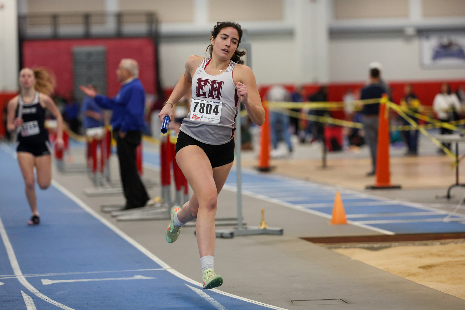 Melina Sarlo runs a relay. RON ESPOSITO