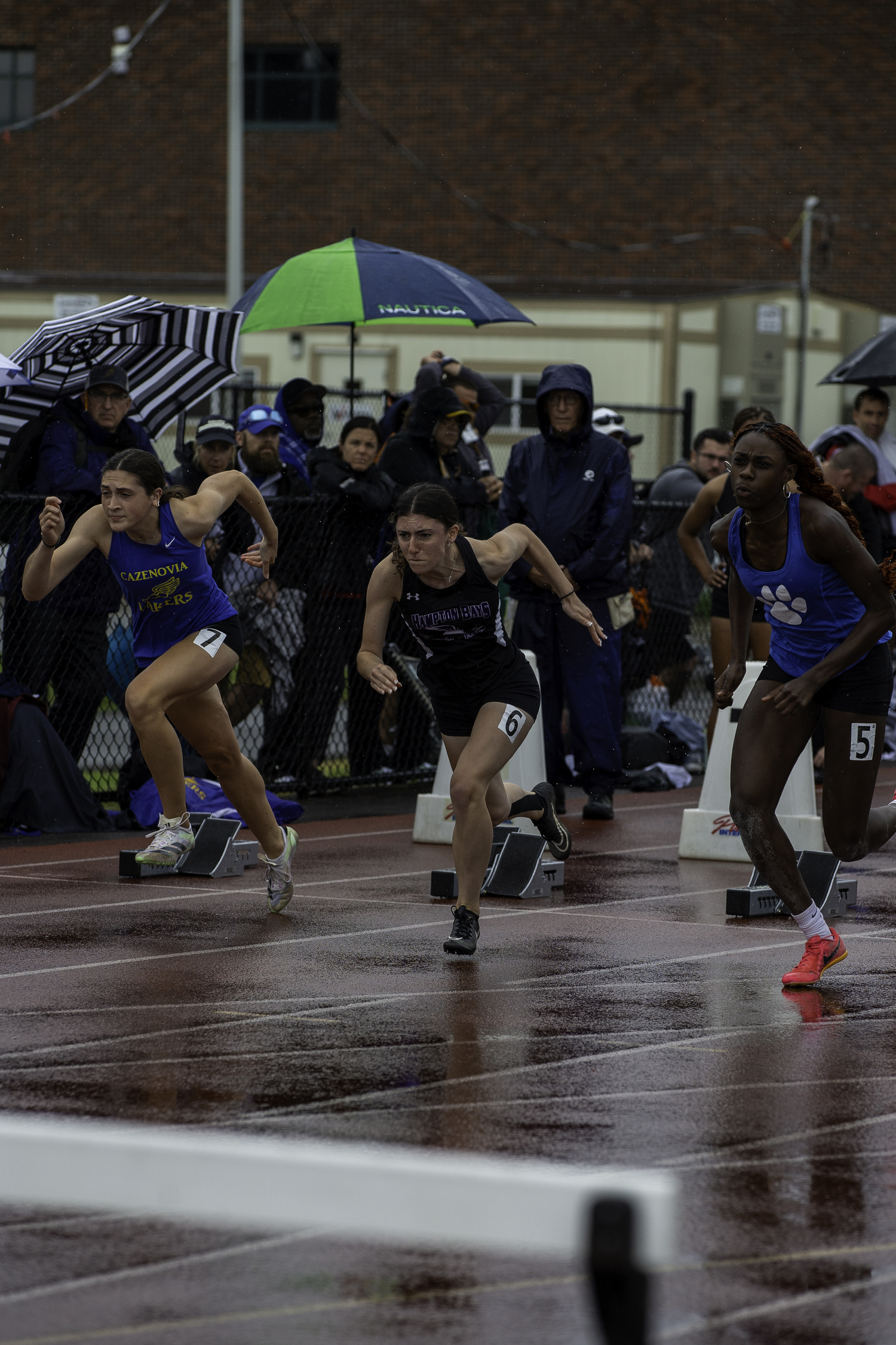 Hampton Bays senior Emma Halsey in the 100-meter hurdles at the New York State Track and Field Championships at Cicero-North Syracuse High School.   ZAIDA TALEV