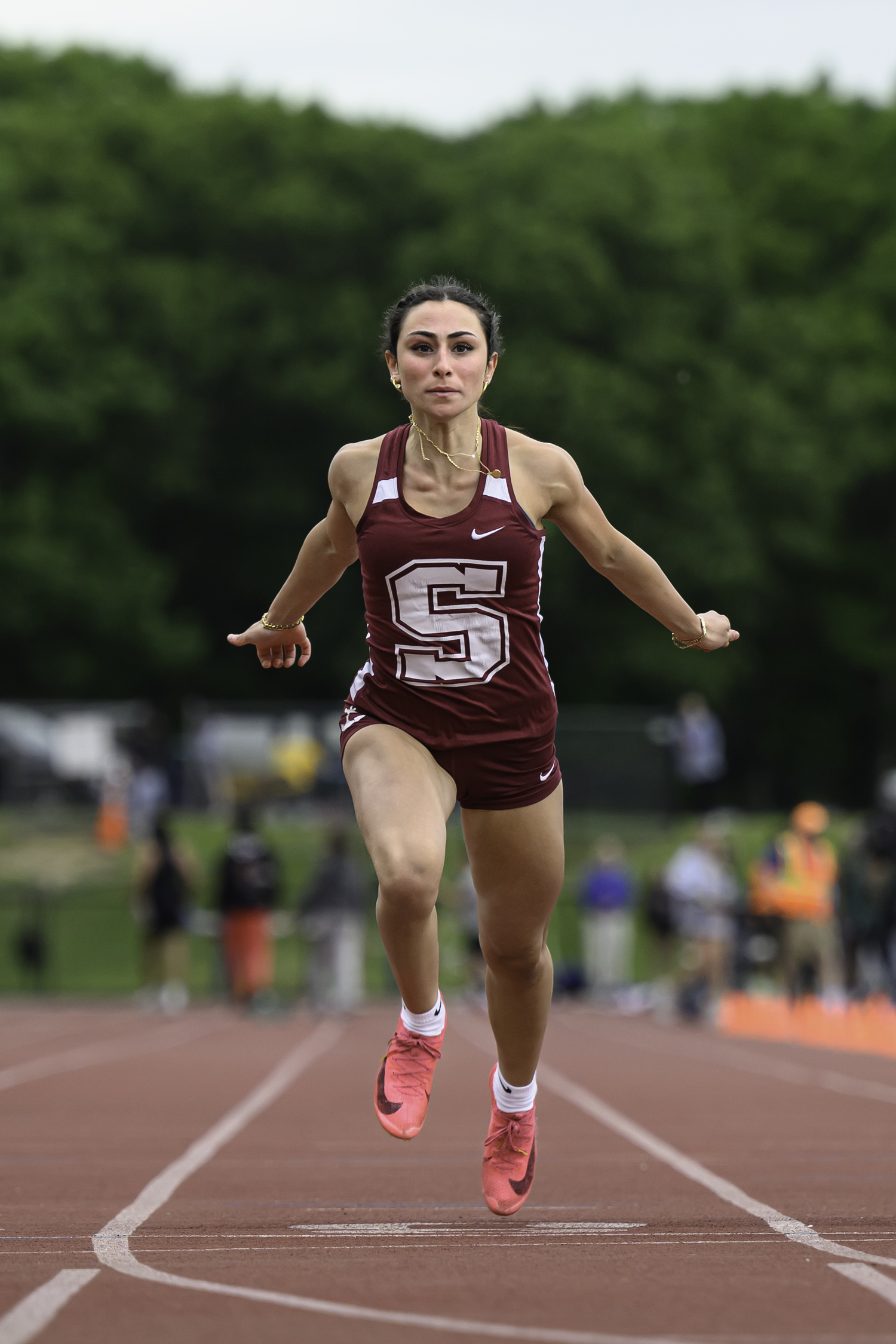 Southampton senior Kyla Cerullo crosses the finish line in the 100-meter dash.   MARIANNE BARNETT