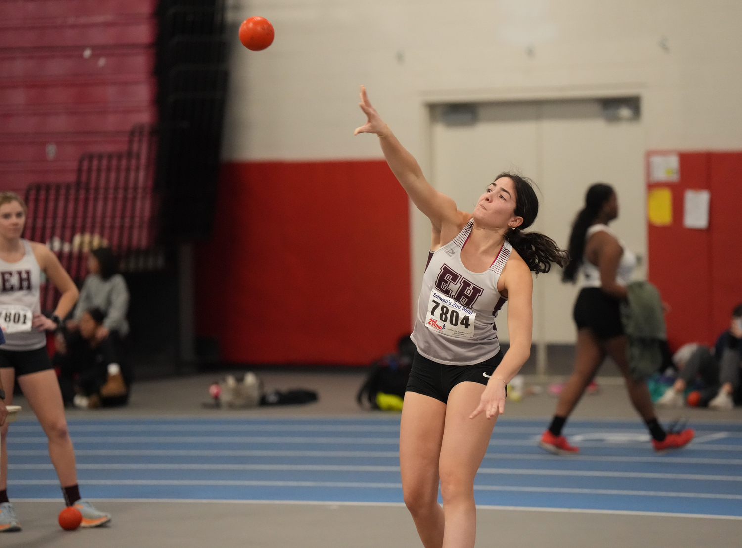 Melina Sarlo hurls the shot put during the winter track season. RON ESPOSITO