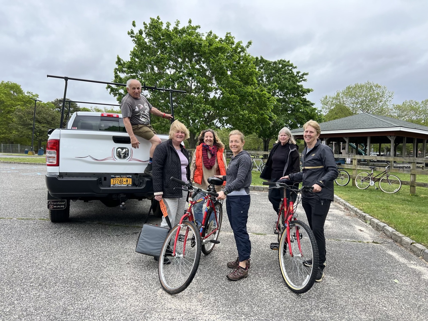 Volunteer Jim Dreeben, in the truck, and bike donors Margaret Schwartz and Wendy Baum, Deborah Hickey, Lorry Werner, and Sigrid Meinel at the recent Bicycle Recycling Day, organzed by Neighbors in Support of Immigrants. In all, 17 bikes in good condition were collected and then given to individuals who were in need of reliable transportation. COURTESY NEIGHBORS IN SUPPORT OF