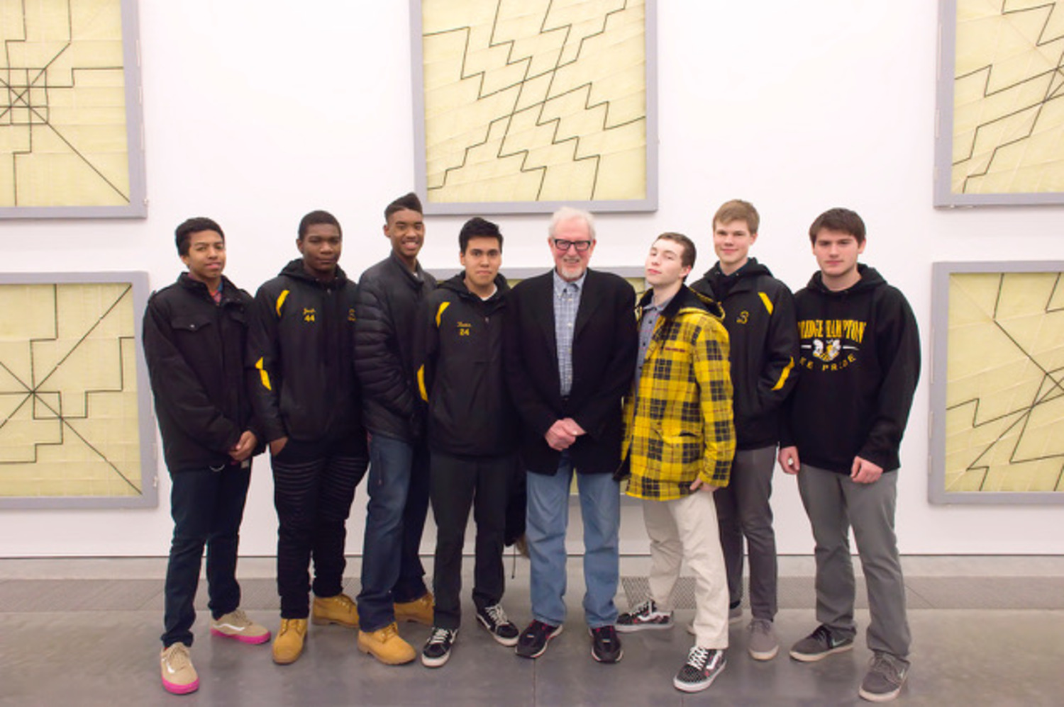 The artist Joe Zucker with members of the Bridgehampton High School's boys basketball team at the Parrish Art Museum. COURTESY BRITTA LE VA