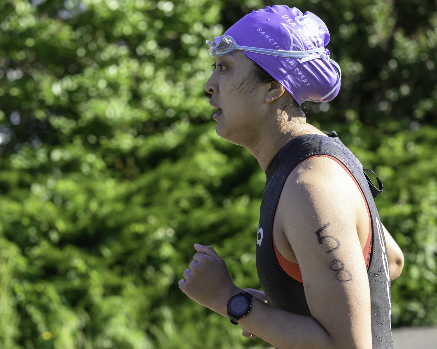 Salena Huang of Brooklyn was one of the first women out of the water of Saturday's triathlon.   MARIANNE BARNETT