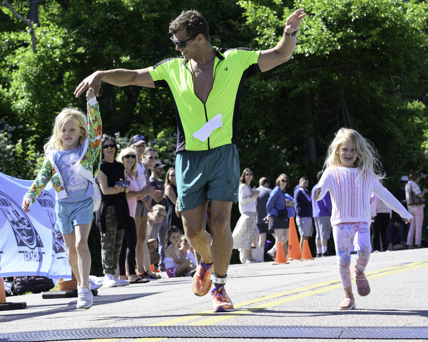 Crossing the finish line with the little ones.   MARIANNE BARNETT