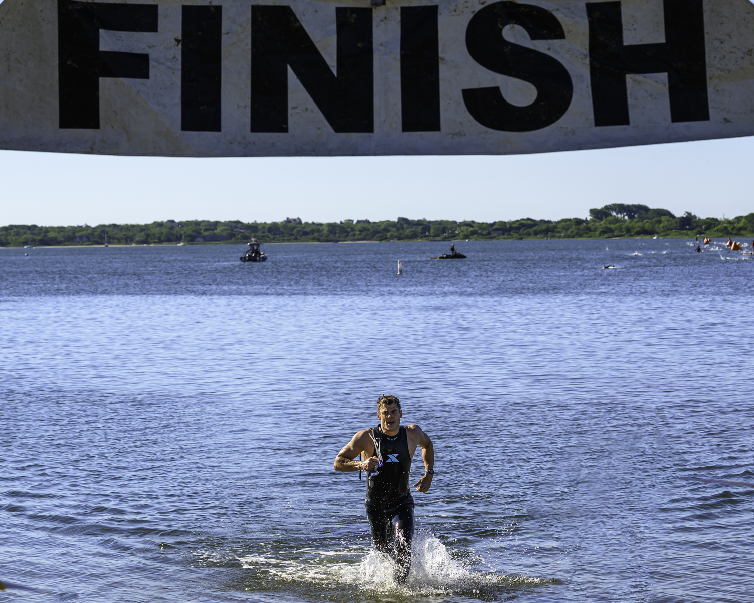 One of the first triathletes to get out of the water on Saturday morning.  MARIANNE BARNETT