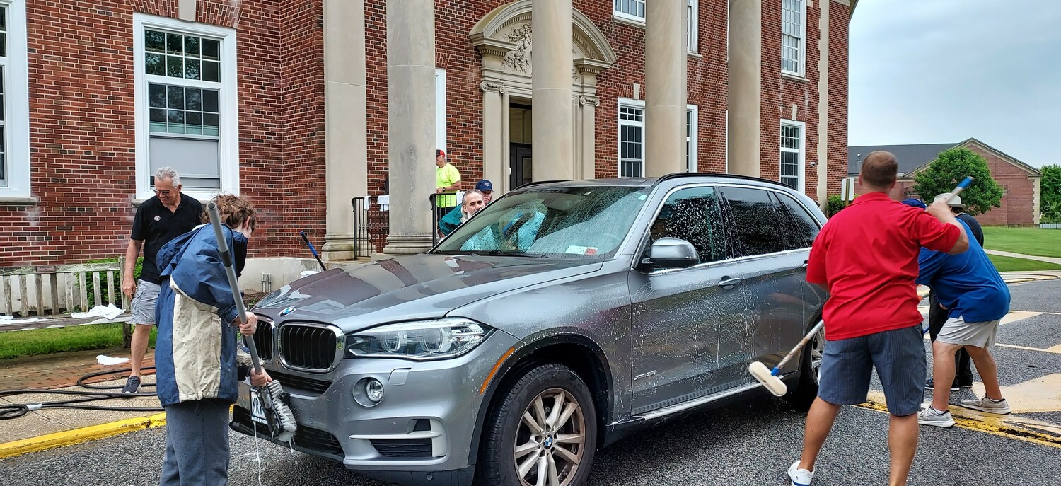 The rain cleared in time to make for a successful fund-raising carwash on June 9 organized by the Westhampton Knights of Columbus Joseph Slomski Council #7423 in front of the Westhampton Beach Middle School. COURTESY JOSEPH SLOMSKI COUNCIL